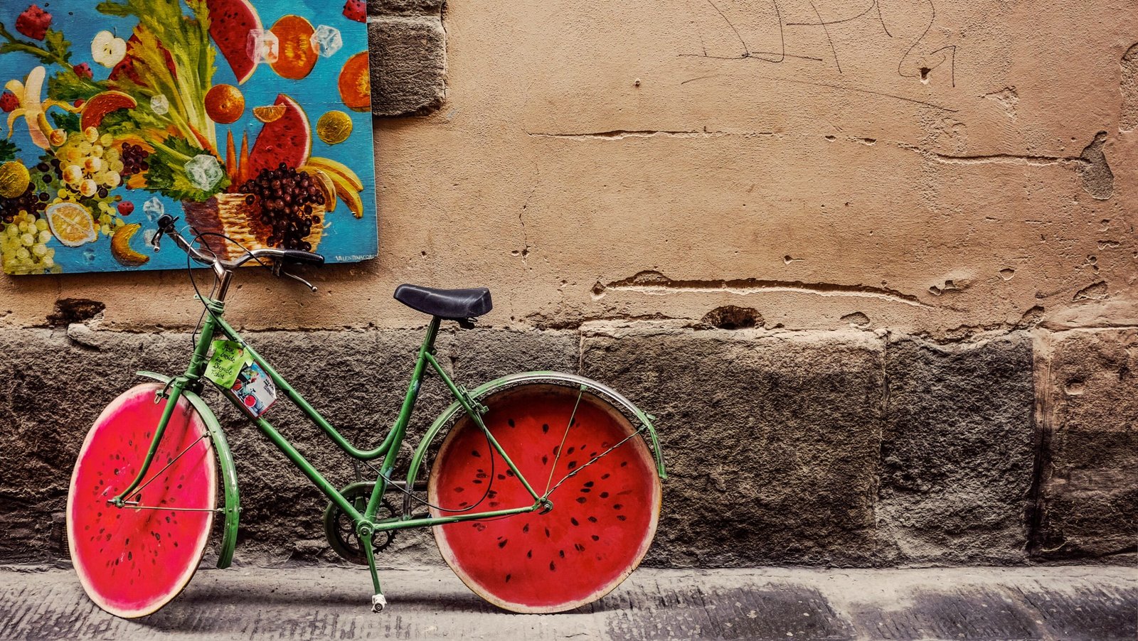 bicycle beside wall